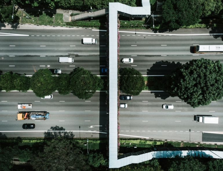 Aerial photography of cars on road during the day. 
