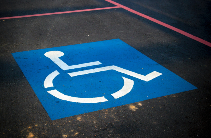 Handicapped symbol on disabled parking